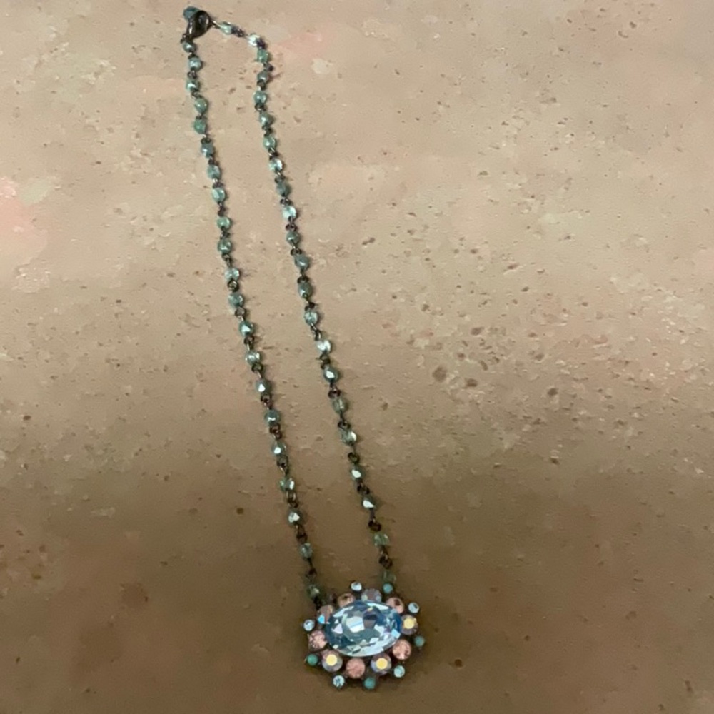 Absolutely gorgeous and a conversation piece. Aqua stone necklace.